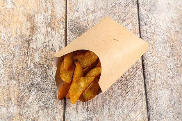 Fried rustic golden potato heap