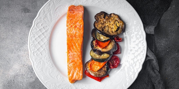 fried salmon and eggplant second course fresh dish healthy meal food snack diet on the table