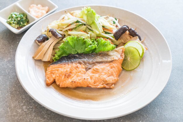 fried salmon steak with vegetable