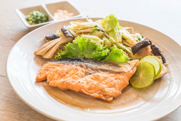 fried salmon steak with vegetable