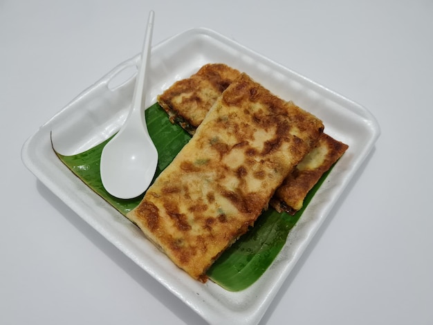 Fried salty martabak containing chopped vegetables mixed with eggs