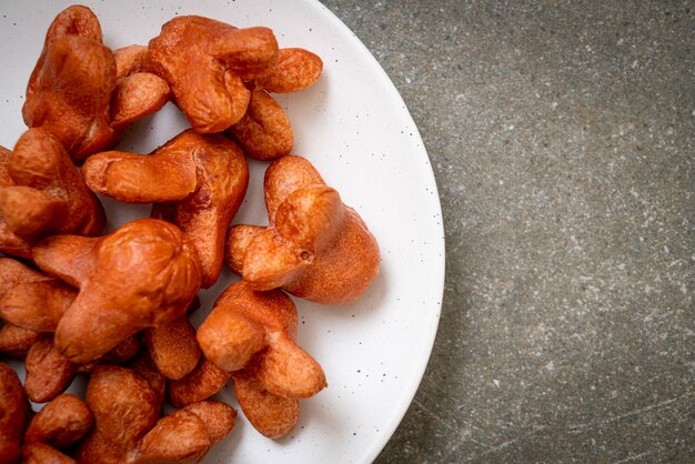 fried sausage with dipping sauce