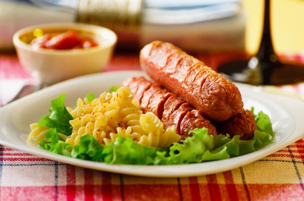 Fried sausage with pasta