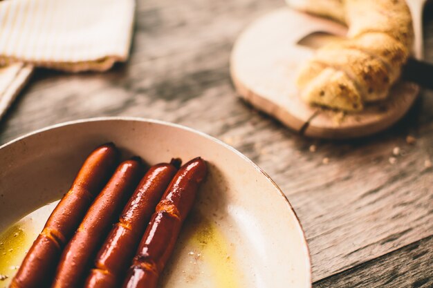 Fried sausages and bread