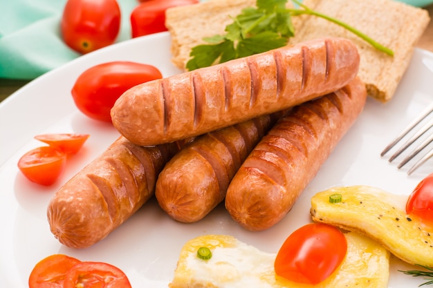 Fried sausages on a plate