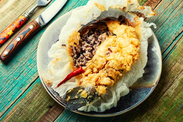 Fried sea bass with wild rice