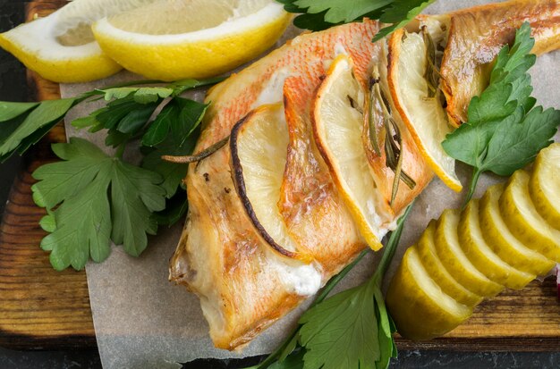 Fried sea fish with lemon and rosemary