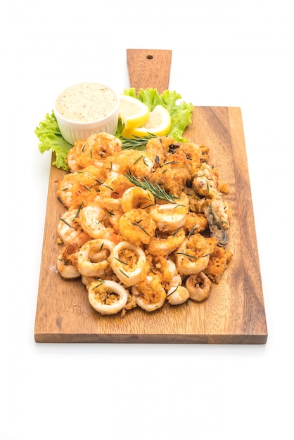 fried seafood (squids, shrimps, mussels) with sauce