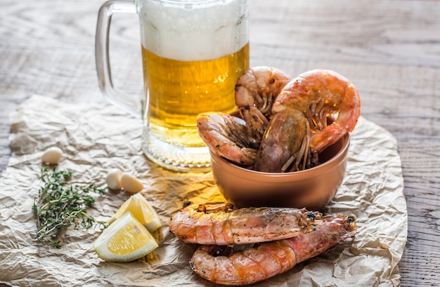 Fried shrimps with glass of beer