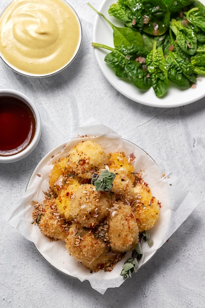 Fried small cheese mozzarella balls breaded in panko