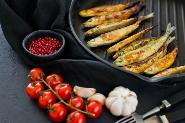 Fried smelt in a pan.