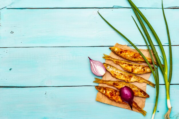 Fried smelt with fresh onions