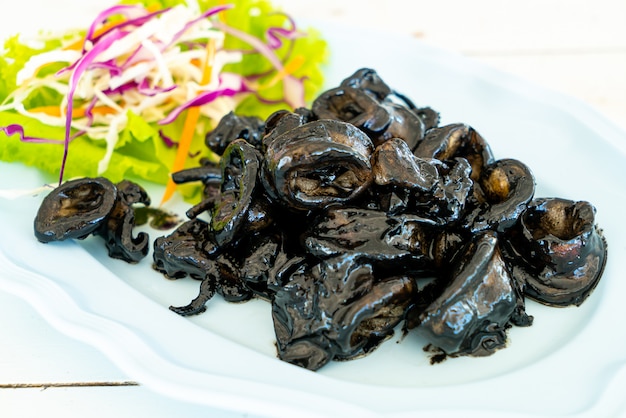 fried squid with squid ink sauce