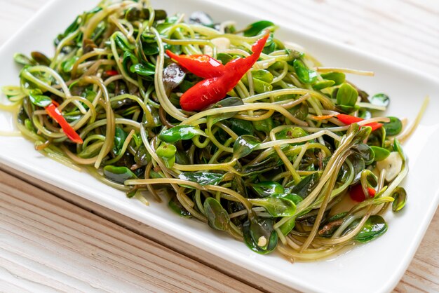 Fried sunflower sprout with oyster sauce