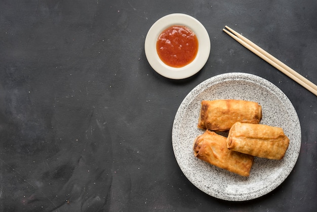 Fried thai spring roll on plate