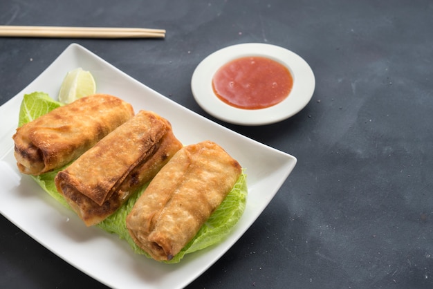 Fried thai spring roll on plate