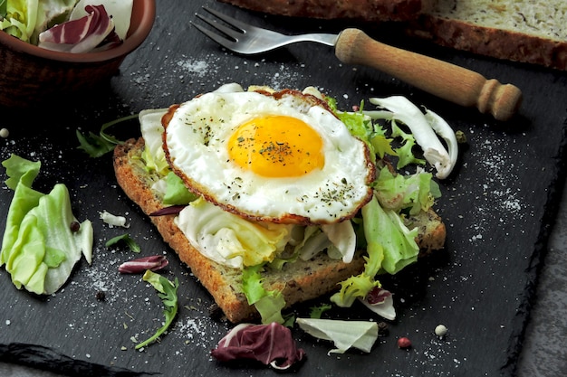 Fried toast with egg and salad. Healthy breakfast or snack. Keto diet. Keto snack or breakfast.