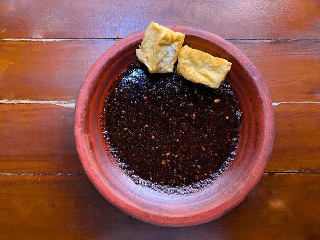 fried tofu with soy sauce on the mortar asian traditional food