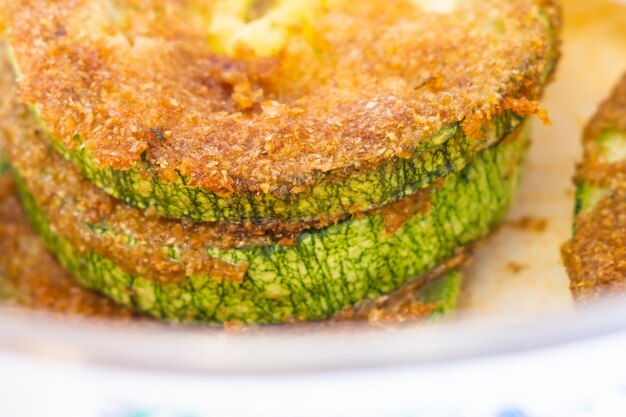 Fried zucchini close up breaded