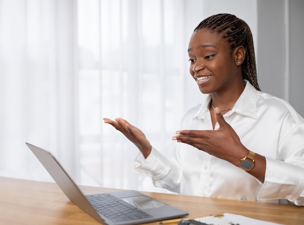 Friendly african woman business consultant have online meeting with client