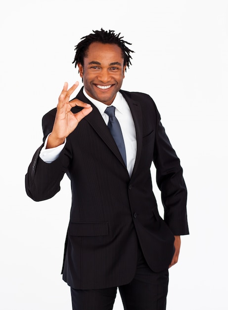 Friendly afro-american businessman showing okay sign 