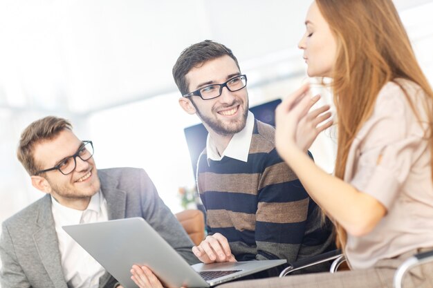  friendly business team working on laptop 