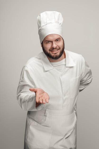 Friendly chef gesturing with hand