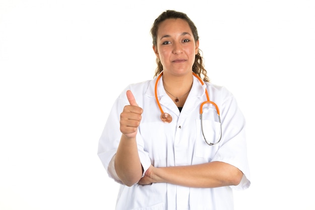 Friendly female doctor smiling - isolated over  white background