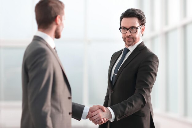 Friendly handshake of business partners