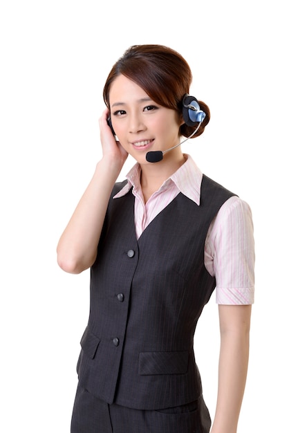 Friendly secretary or telephone operator on white wall.