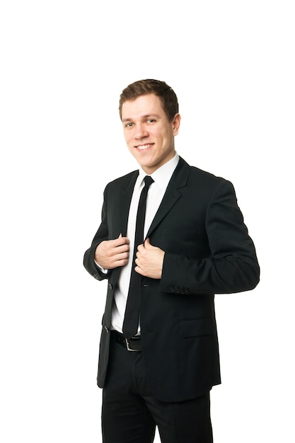 Friendly and smiling businessman looking at camera with reliability isolated on white background