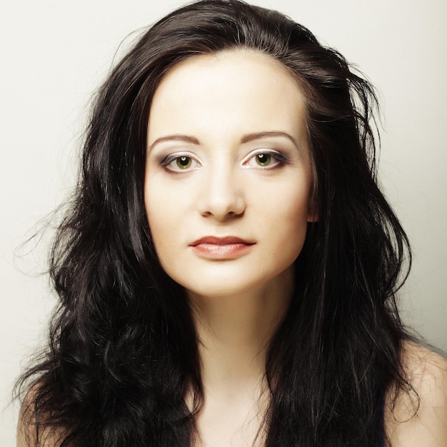 Friendly smiling young woman portrait