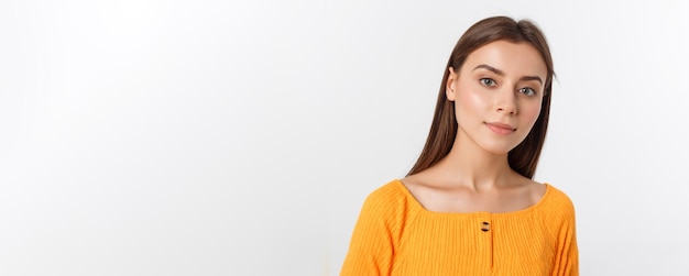 Friendly smiling young woman with beatiful face portrait studio shot