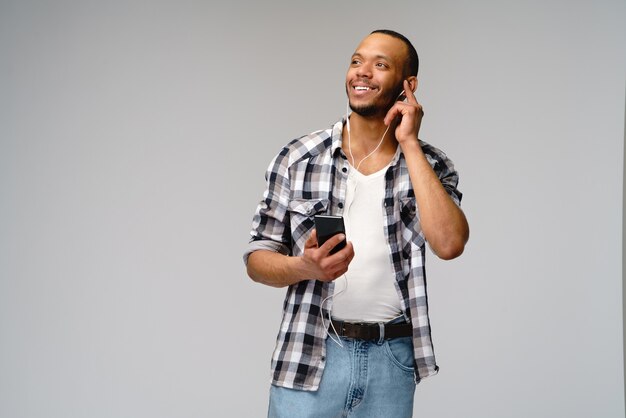 Friendly young man wearing a casual shirt