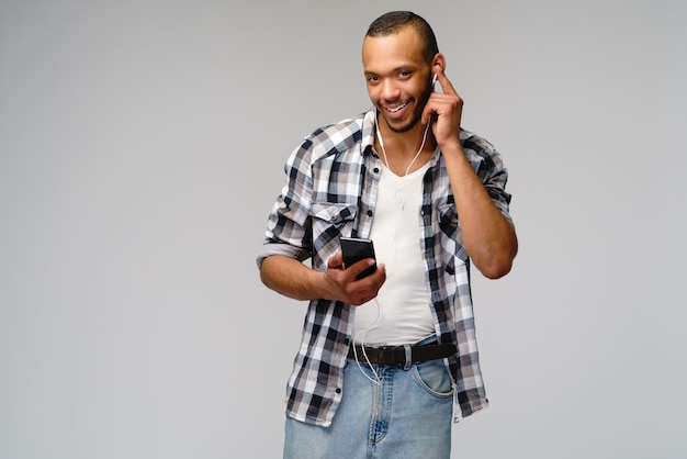 Friendly young man wearing a casual shirt