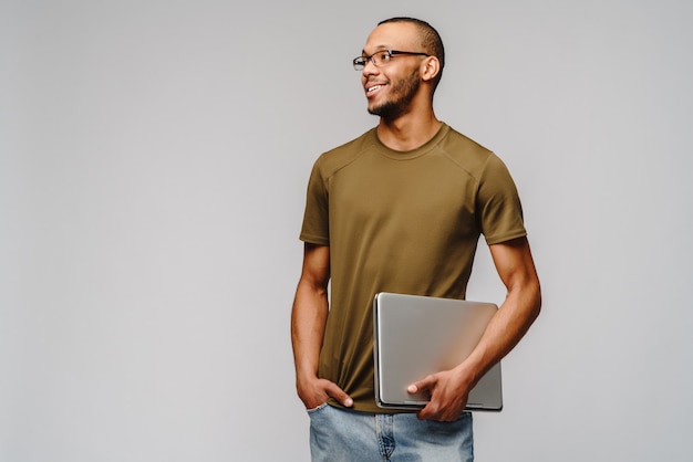 Friendly young man wearing a green t-shirt