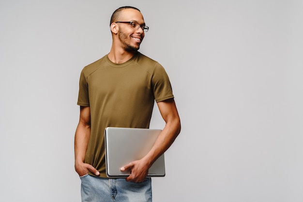 Friendly young man wearing a green t-shirt