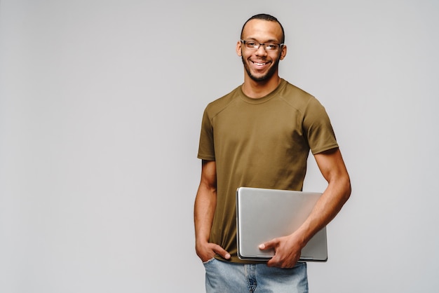 Friendly young man wearing a green t-shirt