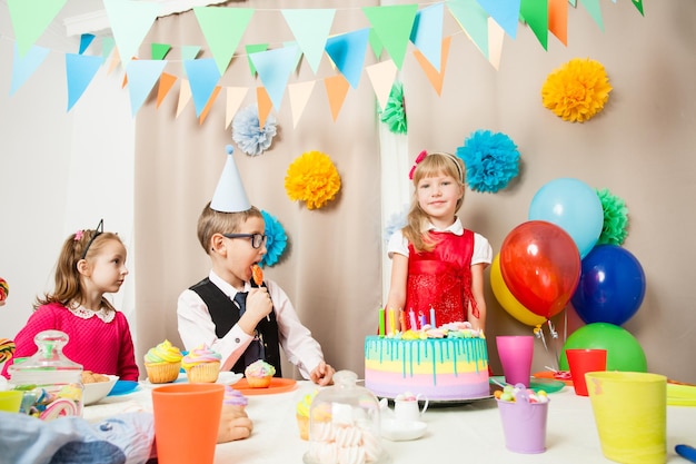 The friends are celebrating girl's birthday party