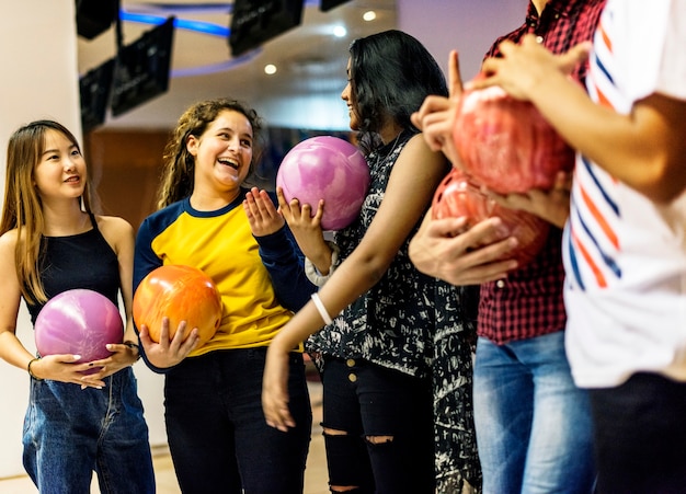 Friends bowling together after school