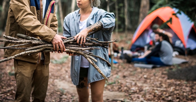 Friends camping in the forest together