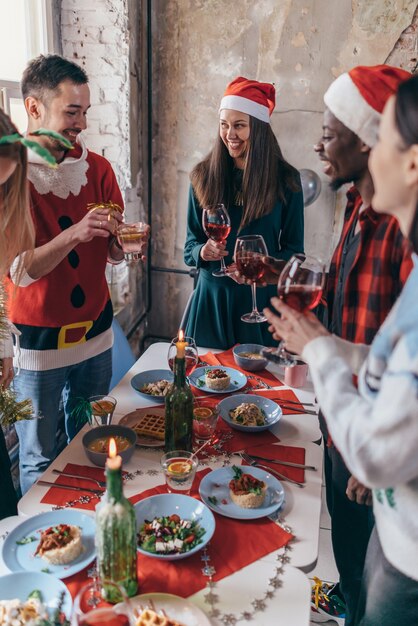 Friends celebrating Christmas or New Year eve.