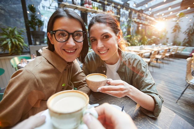 Friends Chattering over Coffee