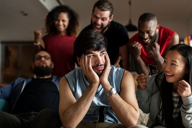 Photo friends cheering sport league together