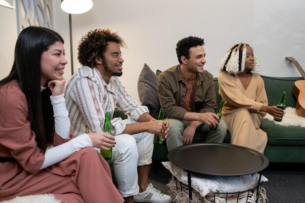 Friends drinking beer during sport match