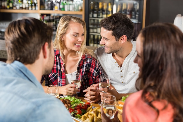 Friends drinking white wine