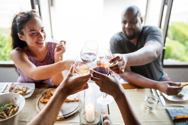 Friends drinking wine in a restaurant