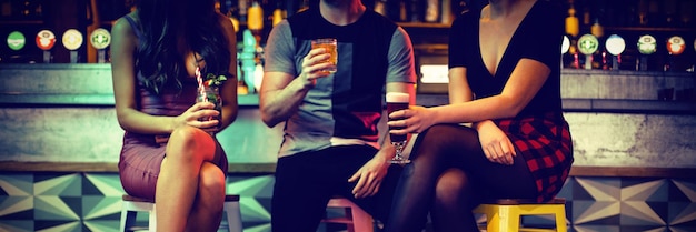 Friends enjoying the drinks at counter