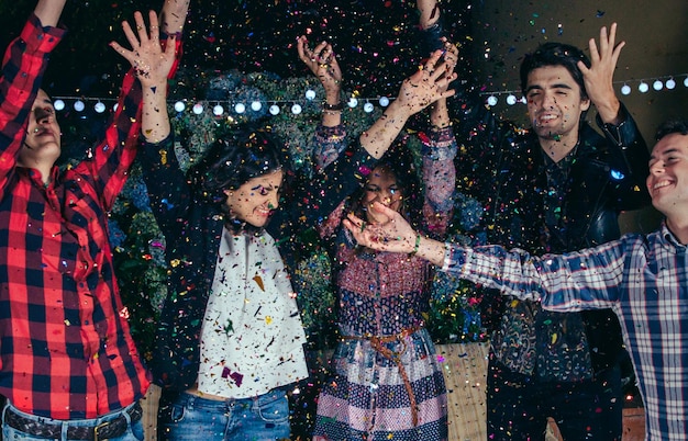 Friends enjoying in party at night