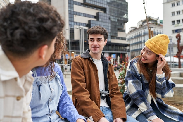 Friends enjoying peaceful conversation on a Spanish bench